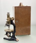 A C. Reichert Wien (Austrian) No. 66880, brass miscroscope, with wooden fitted case.