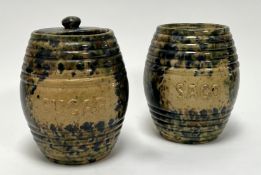 A pair of Scottish Pottery Sago and Sugar storage jars, glazed with mottled green, blues, and