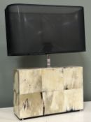 A decorative table lamp of rectangular form, the base constructed from natural bone panels, complete
