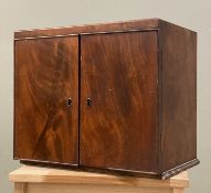 An early 20th century mahogany collector's cabinet, twin panel doors enclosing five drawers to