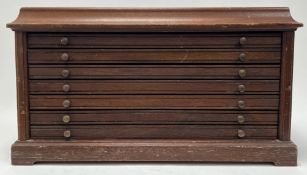 A mahogany John Pinchers 100 Greatest Masterpiece silver medallions collectors case with seven green