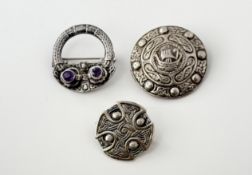 A silver targe style circular brooch with Viking longboat central panel: d. x 3.5cm together with
