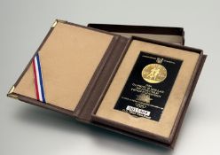 A United States of America Mint, West Point 1984 Olympic $10 proof gold coin: d. x 2.5cm number