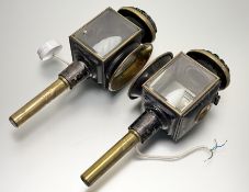 A pair Victorian brass and japanned metal carriage lanterns, later converted light fittings. (l-