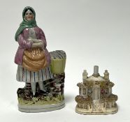 A Victorian Staffordshire flatback figure of a fisherwoman (h. 14.5cm), together with a 19thc