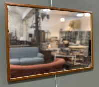 A vintage wooden rectangular wall-hanging mirror (l. 85cm x 59.5cm)