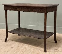 An early 20th century Anglo-Indian occasional table, with heavily carved top and lower-tier