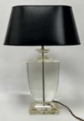 A Mid--Century lucite table lamp of urn form with chrome fittings, complete with an oval form