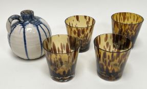 A collection of four hand-blown tortoise shell pattern tumbler glasses (h. 9.5cm), together with a