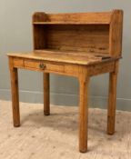 An early 20th century pitch pine school desk, shelf and ink stand to top, fitted with frieze drawer,