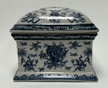 A modern Chinese ceramic blue and white Amorial box with craquelure design, decorated with lions and