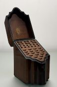 A late 19th century mahogany and crossbanded knife box, with hinged door enclosing a fitted