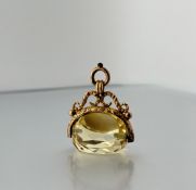 A 9ct gold swivelling citrine fob in 19th century style, stamped 