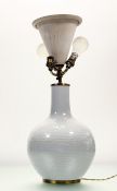 A Chinese pale celadon-glazed bottle-form vase mounted as table lamp, with moulded decoration ,