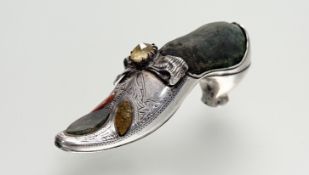 A late Victorian silver novelty pin cushion, Adie & Lovekin, Birmingham 1891, modelled as a lady's