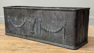 A cast lead garden trough, each long side decorated with a Classical urn and foliate swags,
