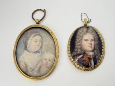 English School, an 18th century portrait miniature of a mother and child, in an oval yellow metal