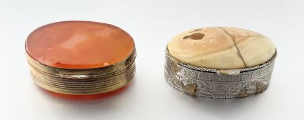 Two oval snuff boxes, each agate mounted, one in yellow metal, the other white, with engraved