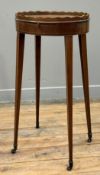 A George III crossbanded mahogany kettle stand, last quarter 18th century, the oval top with