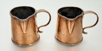 A pair of late 18th/early 19th century country house copper jugs, each of tapering cylindrical
