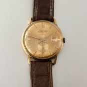 A Waltham 18ct gold cased gentleman's wristwatch, 1960's, the circular gilt dial with date