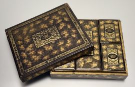 A mid-19th century Canton Export black and gilt lacquer games box, the cover centred by a gilt