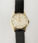 A Tudor 9ct gold gentleman's wristwatch, 1950's, the champagne dial with Arabic and baton numerals