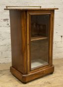 An Edwardian inlaid walnut display cabinet, brass rail to top with inlaid urn patera, over glass