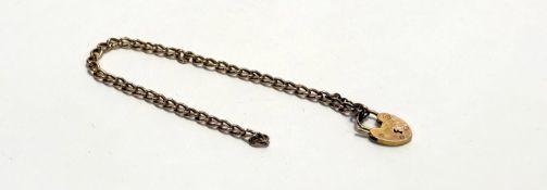 A 9ct gold curb link bracelet with heart shaped padlock - not closing: d. x 6cm 1.7g