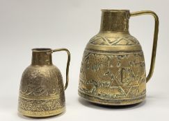 A late 19thc Islamic damascus brass pitcher, decorated with various animals and star shapes with
