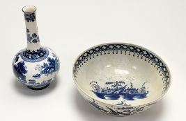 A late 18thc English creamware blue and white punch bowl, hand-painted in a chinoiserie landscape