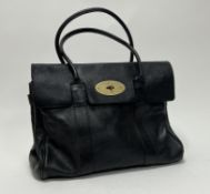 A vintage Mulberry black leather Bayswater handbag with brass hardware, two internal pouch
