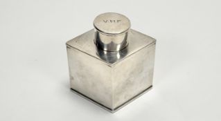 A Queen Elizabeth II Mapin and Webb silver triangular loose leaf tea caddy with engraved initials V.