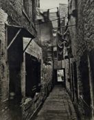 A analog print by Thomas Annan (1829-1887) of Close No. 101 High Street Glasgow, in a glazed