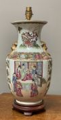 A 20th century Chinese Famille Rose vase table lamp, decorated with floral motifs and figures in