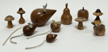 A collection of English yew wooden decorative wares, comprising a graduated set of four wooden