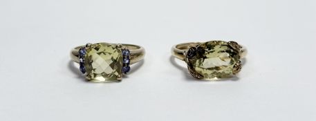 A QVC 9ct gold ring set a cushion cut citrine approximately 3ct set three lavender colured stones to