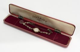 A Rotary vintage 9ct gold manual wind wristwatch with silvered dial and roman numerals at the