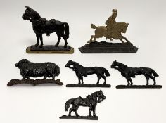 A group of various cast-iron doorstops comprising, a horse with sadle raised on gold painted