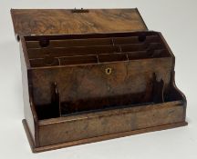 A Victorian burr walnut stationery box, with hinged top revealing fitted interior, and front pen and