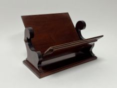 A mahogany table top book trough with shaped sides (h. 22cm x w. 32cm)