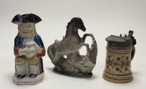 A collection of various wares comprising a Staffordshire Toby Jug (shows cracks) (h-23cm), a late