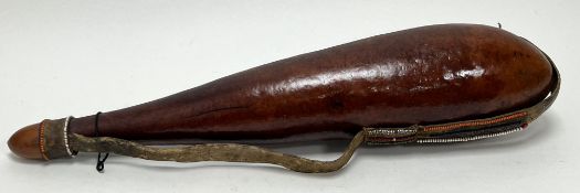 A Kenyan tribal Maasai gourd with beaded leather strap (l. 60cm)