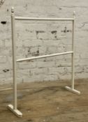 A painted pine two-bar towel rail: H. 91cm L. 80cm