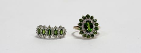 A QVC 9ct gold ring cluster ring set oval green stone within a surround of nineteen diamond points