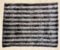 A modern faux fur throw by Nobilis of Paris. L. 190cm D. 155cm