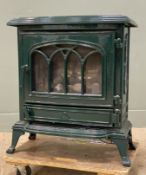 A modern cast-iron gas stove by Broseley, model Canterbury, decorative coal front finished in forest