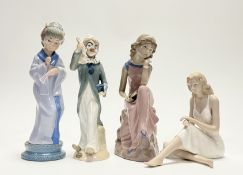 A group of four figurines comprising, a Torralba Geisha figure raised on circular base (marked