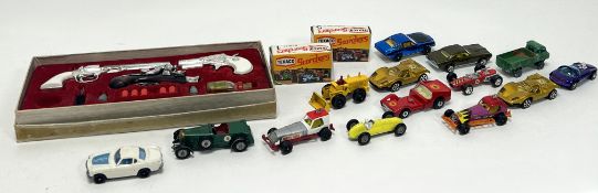 A large collection of vintage car models, comprising a Corgi 'Rockets' Volvo, a Lesley 'Models of