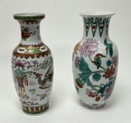 A modern Chinese Famille Rose vase of bulbous form, decorated with polychrome enamels on a white